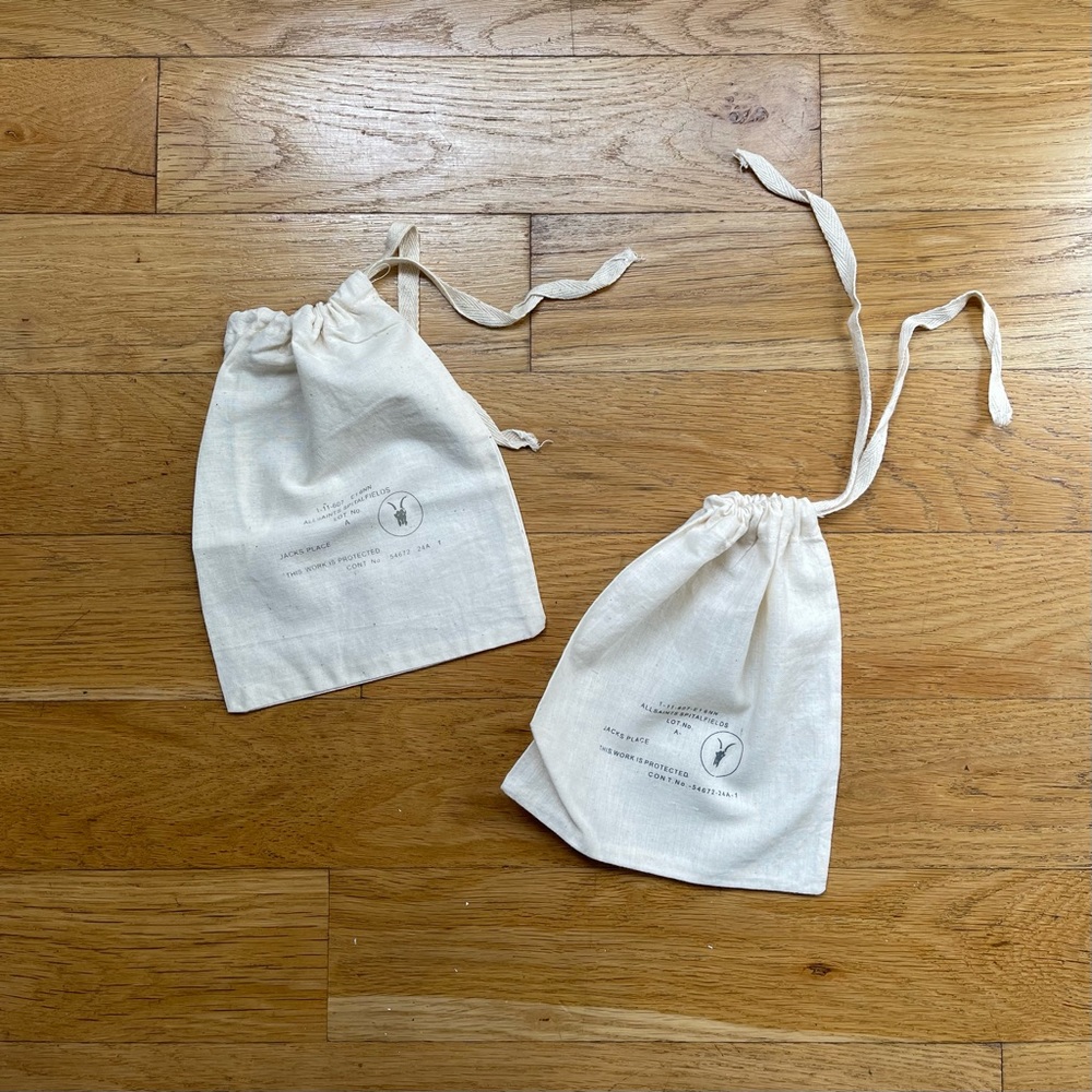 ivory AllSaints dust bags (set of 2)